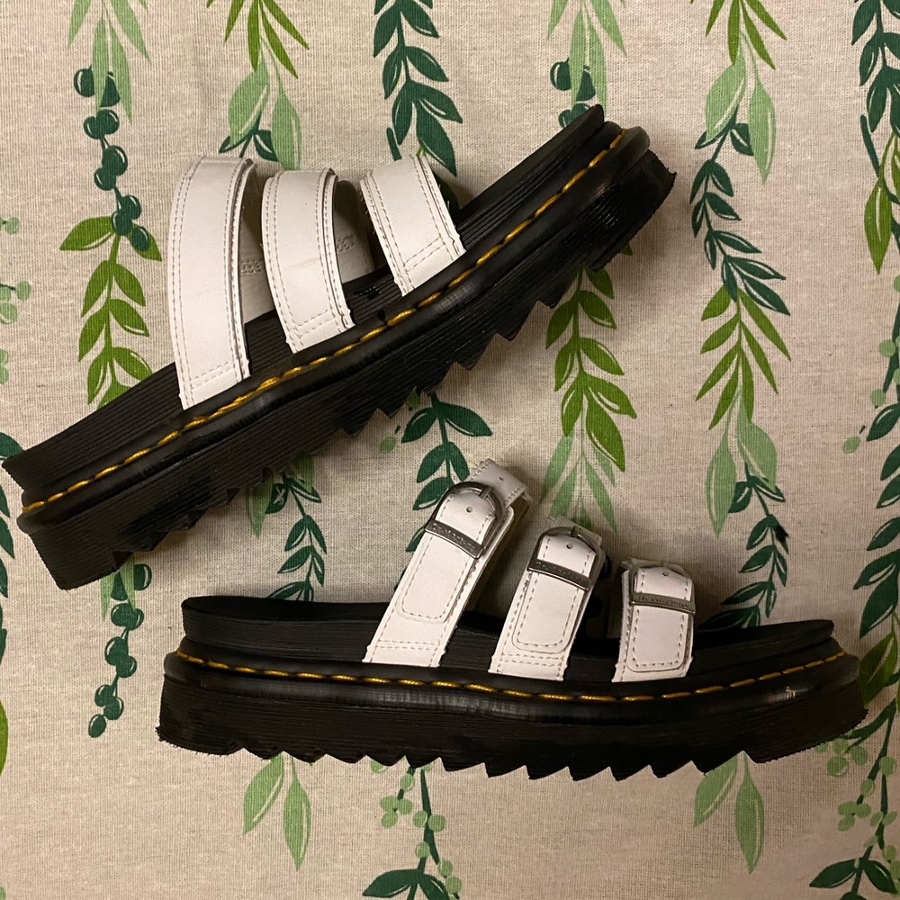 white and black doc martens sandals